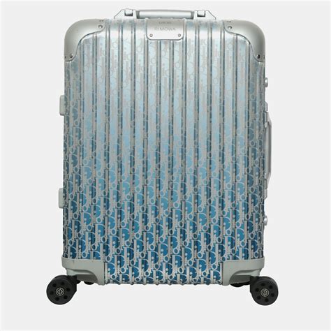 silver dior suitcase|used Dior handbags for sale.